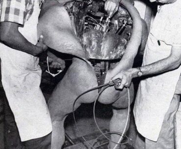 Disney technicians repairing an animatronic figure