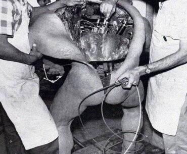Disney technicians repairing an animatronic figure
