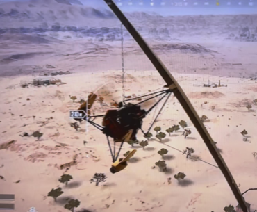 Glider snipe over a city