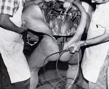 Disney technicians repairing an animatronic figure