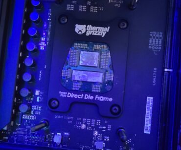 Delidded 7950X3D with an iron and dental floss. Mounted on 360 AIO