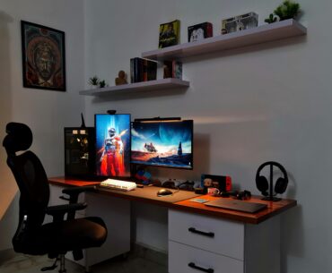 Where I Game and Work (Area above and below the shelves is a bit empty, working on those)