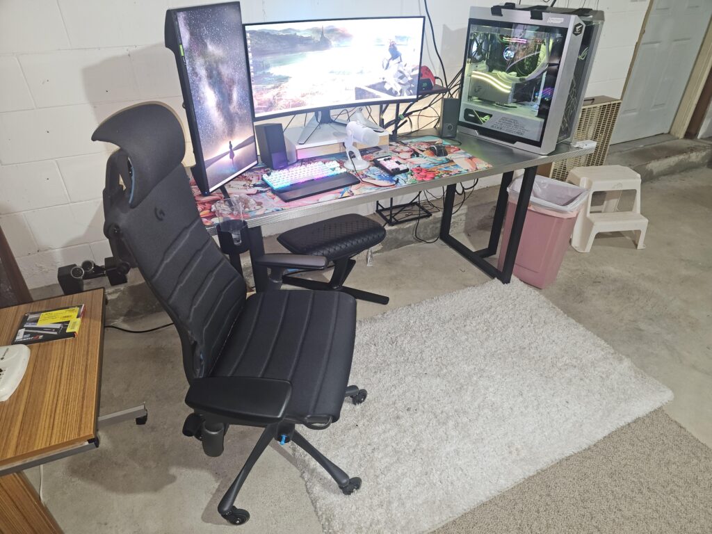 My finally completed setup, I will be moving it into my bedroom eventually, going to look way better. Cable management is not that great, I will give an updated photo of it in my bedroom.