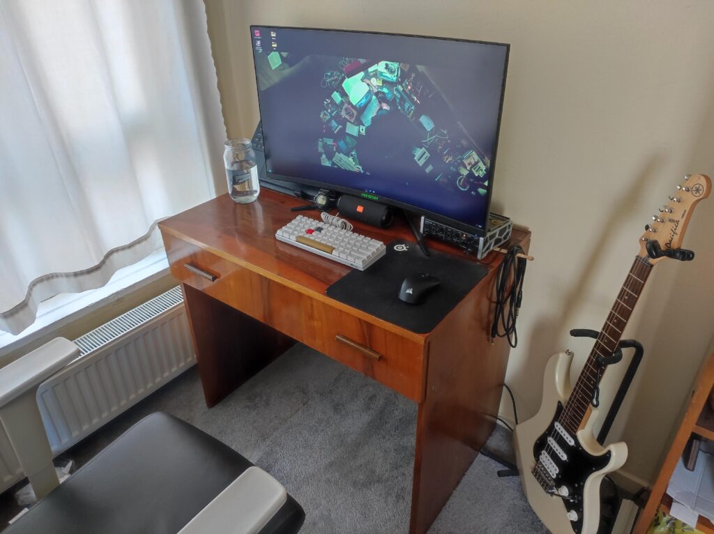 just bought this 32" monitor and i think its a bit too big for my desk 😅 now i have no place to put my laptop but its better than my old setup (15" laptop and 22" external monitor). any genius ideas for my space struggle?