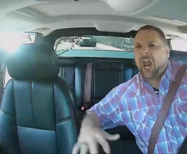 Driving in Night City when some Gonk stops in the middle of the road
