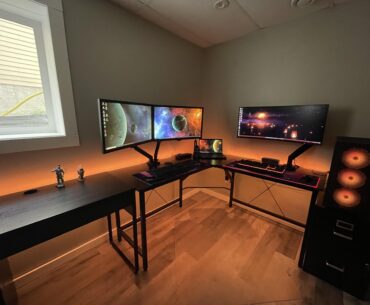 Work setup on the left, gaming on the right. Just needs some personality on the walls now