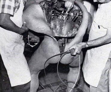 Disney technicians repairing an animatronic figure