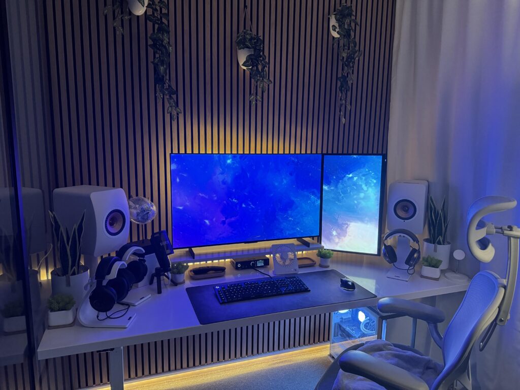 Did some upgrades to my station - Should i move the speakers to flank the big screen and have the vertical monitor more to the right?