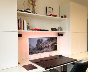 Cozy, modern desk setup with loads of storage space powered by a hidden Mac Mini