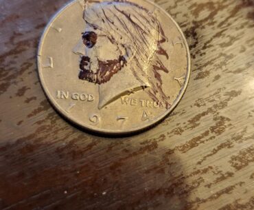 Working on a Hobo Nickel for Neotropolis. Showing off the rough concept before carving. Need critique.