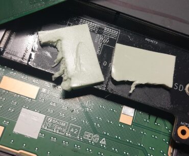 Laptop crashed, doesn't boot anymore, I open it and find this underneath the SSD. What are these? And why did they turn sticky and wet?