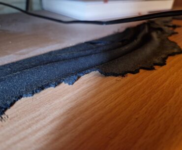 After using a cheap mouse mat for a year, never put water or hot tea cup on it. What materials should I avoid not to have this again? (took me more than 1hr to clean up the mess)