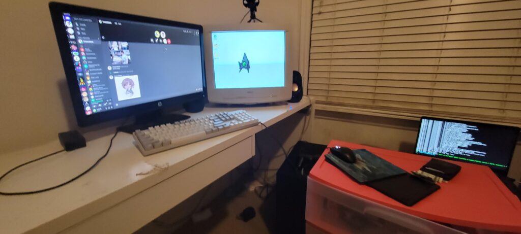 Moved to my mothers house for winter break, needed more space on my desk. I call this setup "checkers"