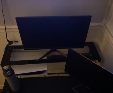 Asking form some help, How could i Put both monitors comfortably on this desk. irs the only desk i have. mointor on shelf is what i want to be the main one