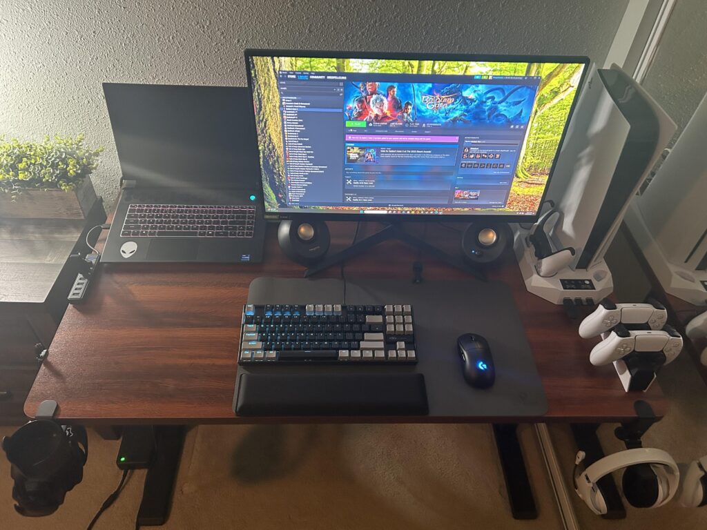 My rig: Alienware RTX 4070 laptop hooked up to an LG Ultragear monitor. The PS5 is there to not feel left out.