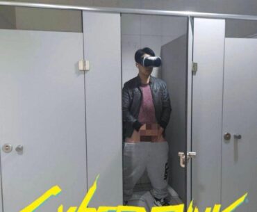 Dude beating off in public toilet with VR headset left door open (says intended)