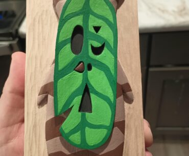 Painted relief carving of a Korok (Basswood)