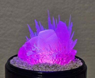 Made a small display for a raw aetherium crystal. Lights up from the bottom so it can sit on a shelf and give off that nice glow like in the game. See 2nd pic for dark room.