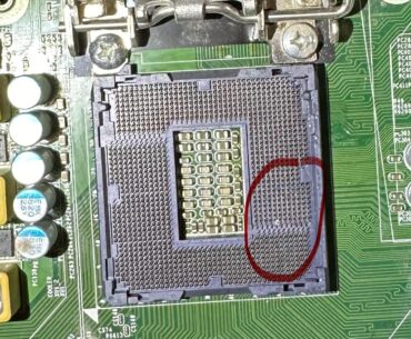 Piece of thermal paste fell in. Does it matter?
