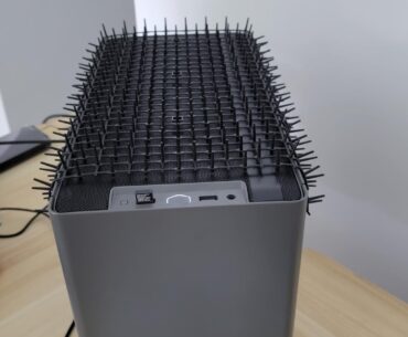 Finally found a way to keep the cats off the gaming computer. NR200P max, cat scat mat with spikes, zip ties. Now they lay on each other.