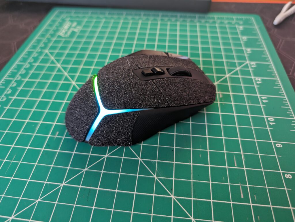 Designed and machine cut a skin made from grip tape for my G502 X Plus