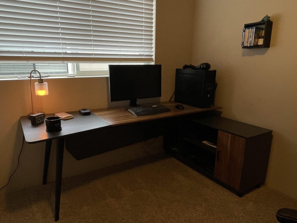 My battle station feels so boring. What can I do to make it feel more cozy and “geeky”? I’m a gamer, creator, and I work from home once a week.