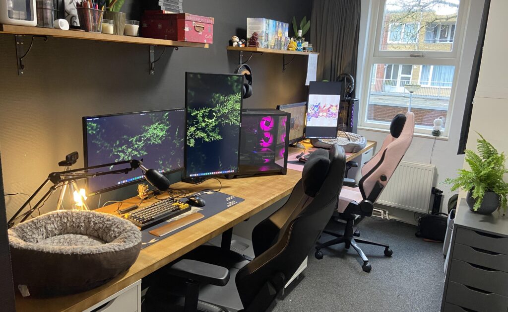 dark themed his/hers setup