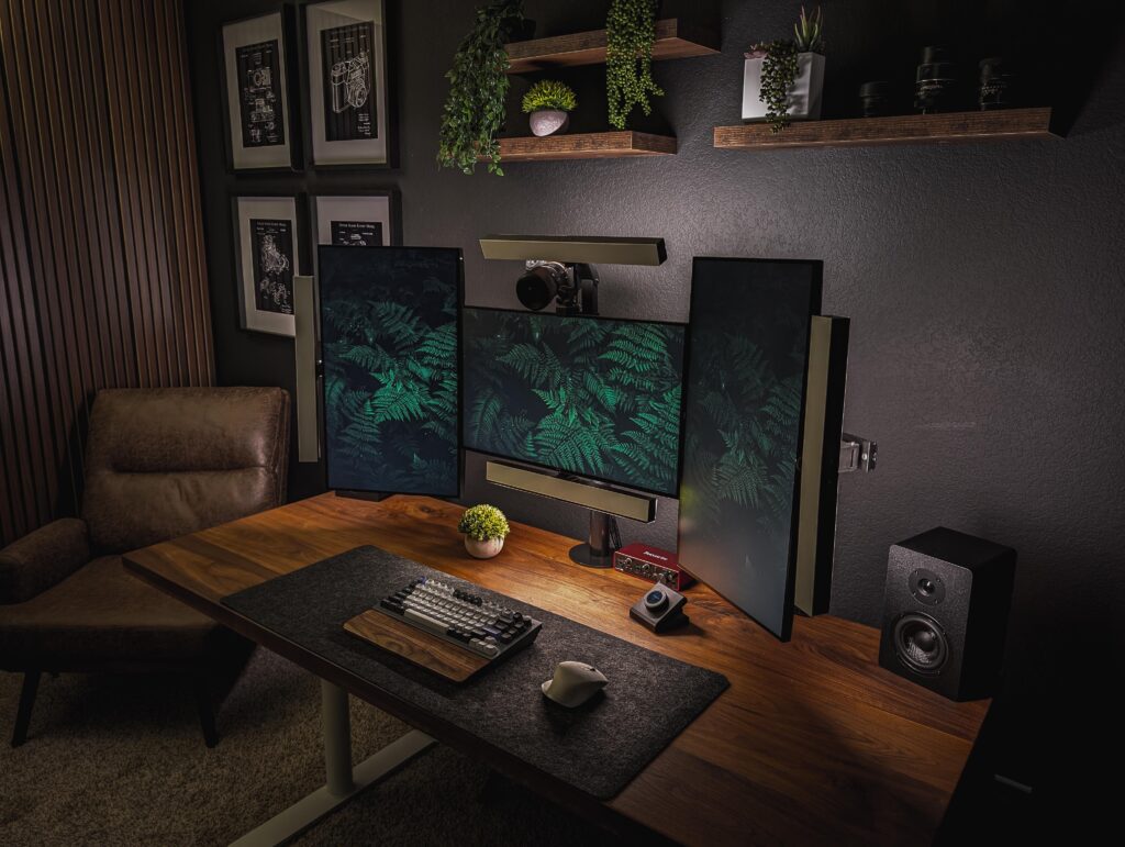 Been working on this setup for the past year. Just added a new set of lights to help with eye strain and clean up the key lights mess. Dev work / Video calls / streaming / video recording / Gaming