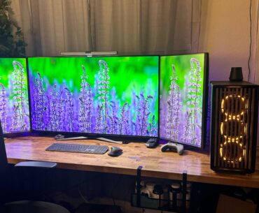 Updated 3 monitor setup. 48" OLED middle with 2 27" side panels