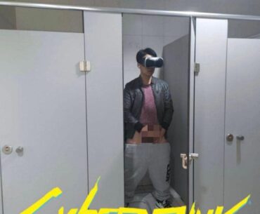 Dude beating off in public toilet with VR headset left door open (says intended)