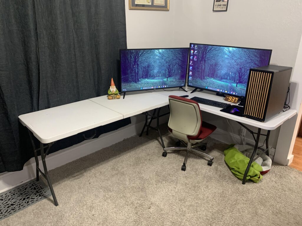 My dual monitor L shaped battle station!