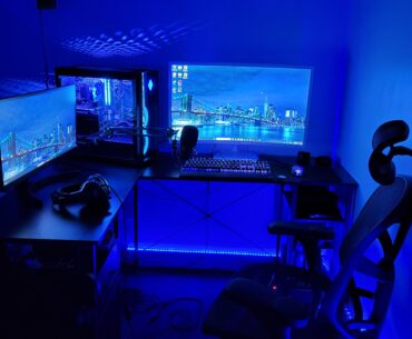 My first serious setup, I'm still working on it, probably going to add another desk behind the big monitor on the right for more desk space, but let me know what you think!