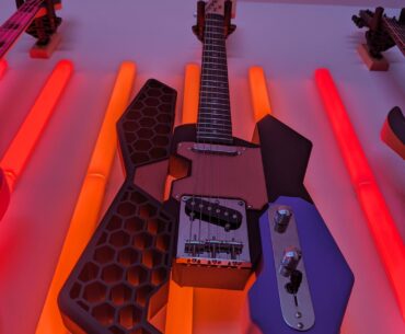 I designed and 3D printed this Cyberpunk 2077 inspired electric guitar