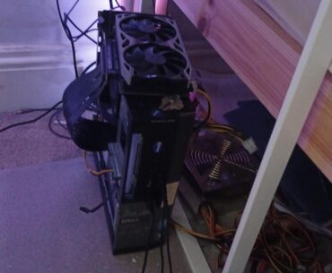 My friends cancerous PC (no its not being built, yes that's an external gpu and psu)