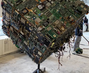 Giant cube made of motherboards ( Found on r/Damnthatsinteresting)