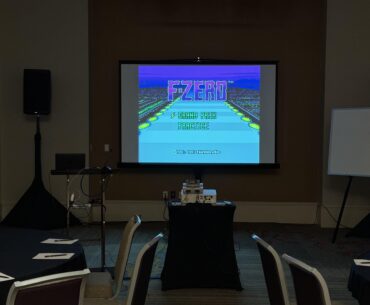 Did it make sense for me to travel to a weeklong business conference with a complete Super Nintendo setup just so I could play on the giant projector screen? No it did not. Do I regret doing it? No I do not.