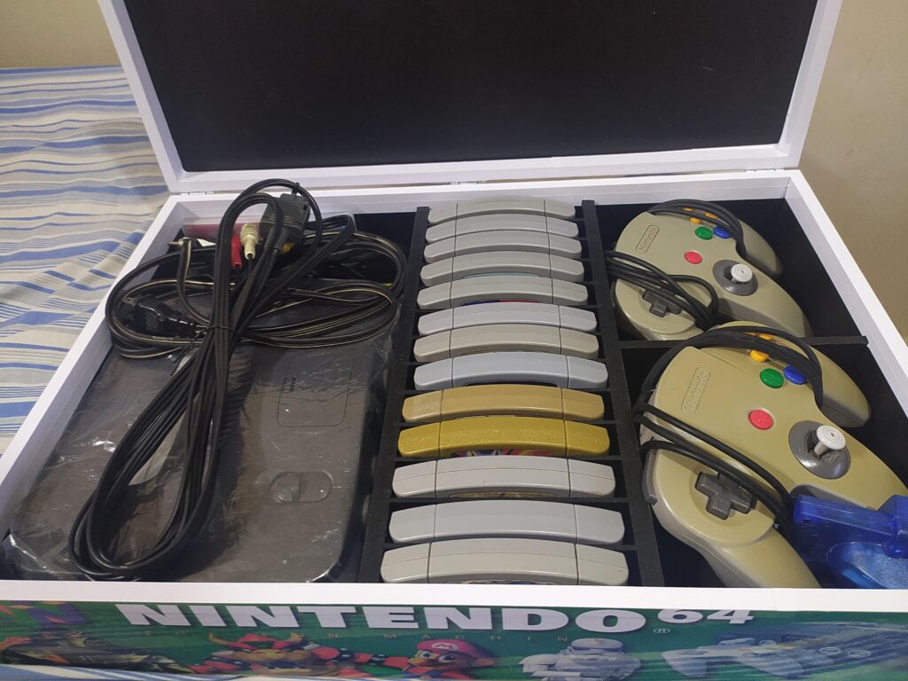 My old Nintendo 64 in a Homecrafted Box Made Only For It. My old Nintendo 64 in a Homecrafted Box Made Only For It.