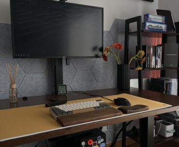 I switched to a floor stand to free my desk from cables