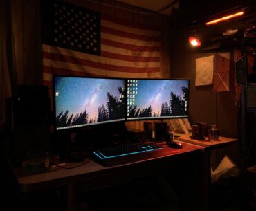 My Junkyard Battlestation. Desk, monitor mounts came from junkyard, trunk off a car I totaled.