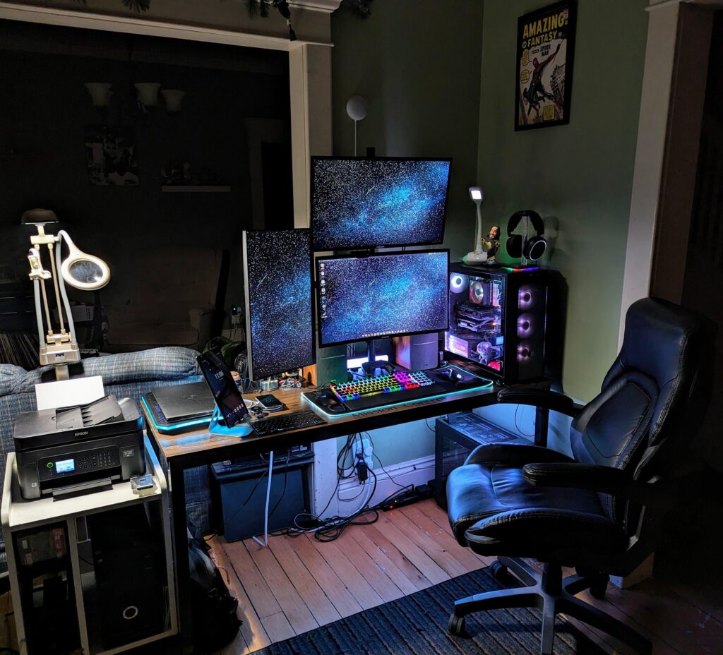 Kids are getting older and using the playroom less, so I sectioned off a corner for a new main floor setup. Still working on the last bit of cable mgmt.