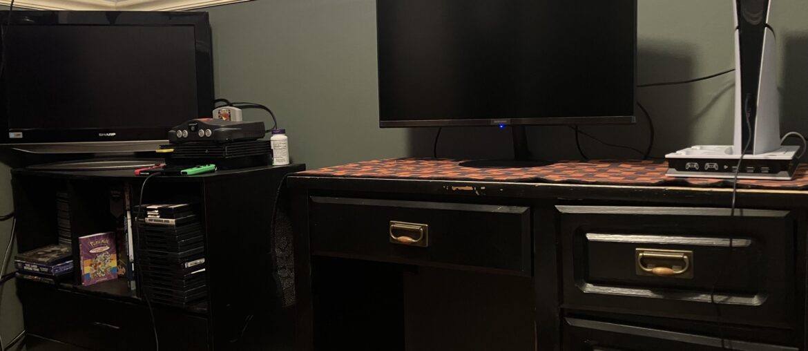 Finally got a monitor. My humble little set-up. Ps2, N64, Switch and PS5