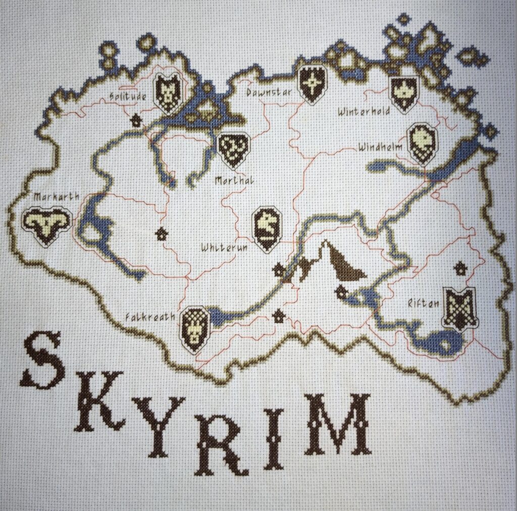 I made this last year, but I think it belongs here. Skyrim cross stitch, 5900 stitches