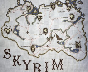 I made this last year, but I think it belongs here. Skyrim cross stitch, 5900 stitches