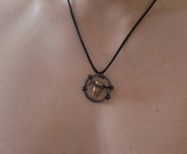 Bday gift a friend made me a bullet necklace.