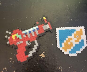 Made a raygun and Who’s Who perlerbead