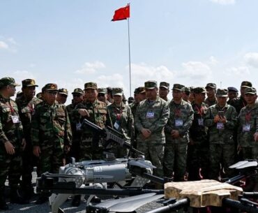 China’s military shows off rifle-toting robot dogs