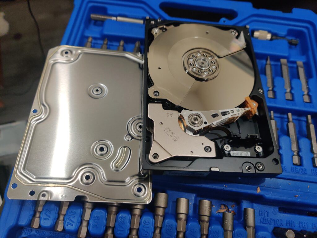 Does anyone else harvest the magnets from old hard drives?  Strong magnets with attached mounting brackets are useful for all kinds of random stuff!