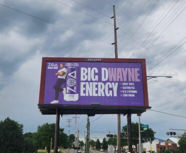 This billboard I saw today feels like it was ripped out of Cyberpunk