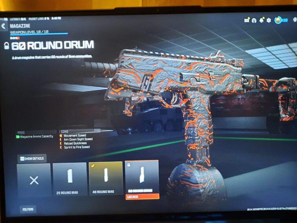 How do I unlock the 60 round mag?