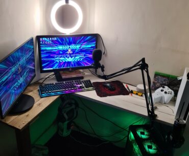 I did a previous post a while ago about my battle station, it was small an basic, with a wired mouse an keyboard, small desk etc.. it was basic but now I've upgraded it an got a new camera arm an mic arm, a built in desk that I did myself an extra monitor.. is there anything more I could do to it?